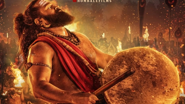 Rishab's Ferocious Avatar in Kantara! This is the Story of Bloodshed in God's Own Garden…
It is God's own garden!
A piece of land nestled in the heart of a dense forest, coveted by all. From kings on their thrones, feudal lords, and chieftains to sorcerers skilled in dark arts, everyone is poised to seize it. They shed blood, they topple bodies. What lies within that massive pit in the middle of the forest? Why do all who set their eyes on "Kantara" bleed and perish? Has the divine Lord Ishwara himself descended to reside there? What is the connection between Barme—who appears like a son of God, grows up with the indigenous people, becomes powerful, and one day stands as the leader of the village—and the royal kings of Bangra? Why do the kings of Bangra continue to target this village, even after generations?
– Kantara is the film that answers these questions!
The story is set in the golden age of the Kadamba dynasty. In the midst of a dense forest lives a community that worships nature as its deity. A king yearns to expand his empire, but that land is not mere soil; it is the identity of its people, the very soul of their ancestors. Amidst this conflict of power and existence, a promise is born. What is the secret behind the Panjurli and Guliga daivas? The soul of this film is the story of the unbreakable bond between the land, humanity, and the divine.
Rishab Shetty is not just an actor in this film; he is a force of nature. The scenes of divine possession are absolutely electrifying. This is not just a physical transformation for a role; it is a phenomenal metamorphosis. His eyes speak volumes; they hold anger, pain, devotion, and the power of the divine. His innocence as a son of the forest, his ferocious avatar when fighting for his people, and the supernatural energy that courses through his body when possessed by the daiva... he lives and breathes every moment. His roar shakes the movie theatre. Rishab hasn't merely acted; he has embodied the character, burning brightly in the role!
Ajaneesh Loknath's music is another pillar of this film. His background score doubles the emotional impact of the narrative. The music during the daiva possession scenes is goosebump-inducing. Arvind Kashyap's cinematography masterfully captures the beauty of the forest, the fury of the rain, and the divinity of the daiva. His artistry in revealing color even in darkness is commendable. Art director Dharani Gangeputra has enhanced the grandeur of Kantara by building magnificent sets. The scene where the chariot goes off course in the main street is highly enjoyable. Every action sequence in the film is of high quality.
The performances by Prakash Thuminadu, Naveen Padil, Rakesh Poojari, and Deepak Rai are excellent. Gulshan Devaiah is decent. It would have been better if Balaji Manohar had been cast in Jayaram's role instead of just providing the voice-over. Although the first half of the film feels a bit long, that much time is necessary to introduce such a vast canvas.
Perhaps Kantara wouldn't have been as haunting if its content was limited to a simple tale of Dharma vs. Adharma or the Divine vs. Dark Magic. The film includes heart-wrenching scenes depicting the practice of bonded labor (Jeetapaddhati). It unveils the many faces of the cruelty of the privileged—and for this reason, Kantara becomes an incredibly important film.